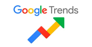 Un logotipo colorido de Google Trends con una flecha apuntando hacia arriba, que representa el crecimiento y las tendencias.