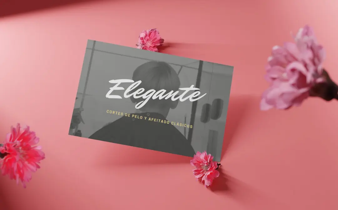 A gray book with the title "Elegante" on a pink background with pink flowers